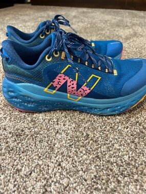 New Balance Blue Trail Shoes with Pink Accent N and Yellow Outline